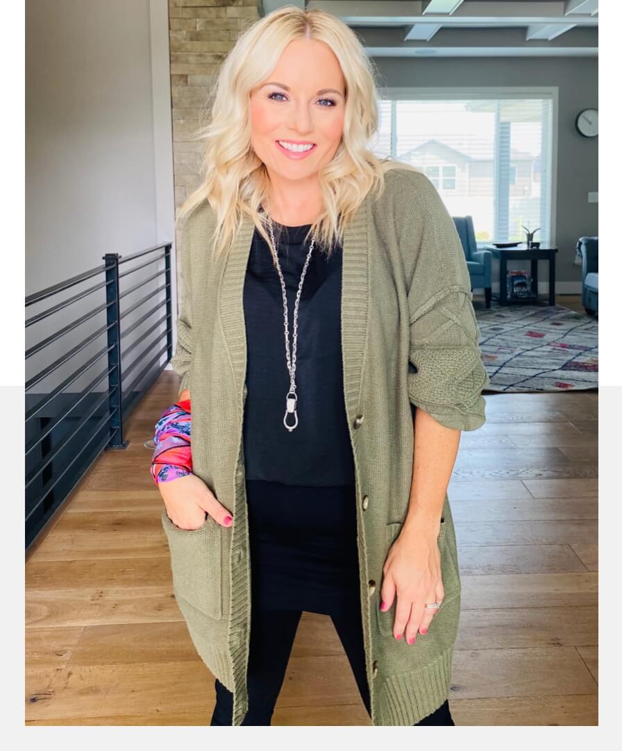 Stylist wearing the Trinity Stitch Cardigan in Olive, Complete Top in Black, M'Leggings in Black, Coy Scarf in Multi, Stirrup Necklace in Antique Silver