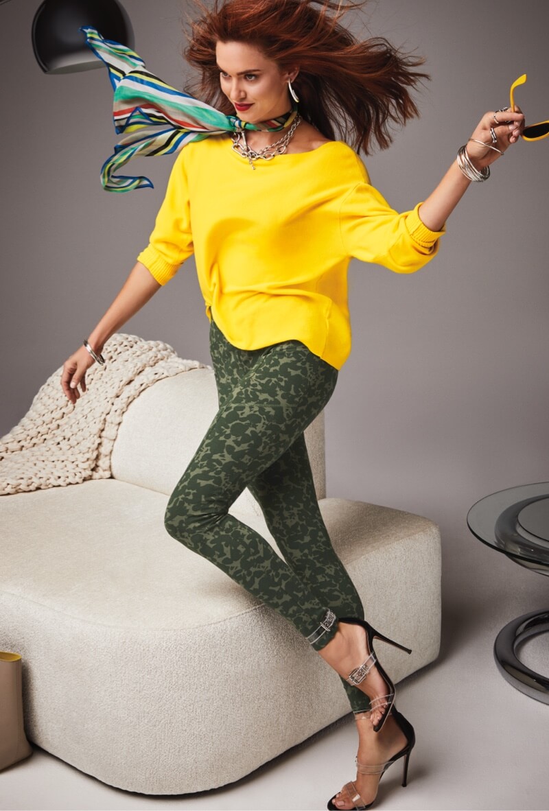 Model wearing Baseline Scarf in Circus Stripe, Buttercup Pullover in Neon Yellow, Marathon Legging in Flam-O, Swagger Hoop Earrings in Silver, and Swagger Necklace in Silver