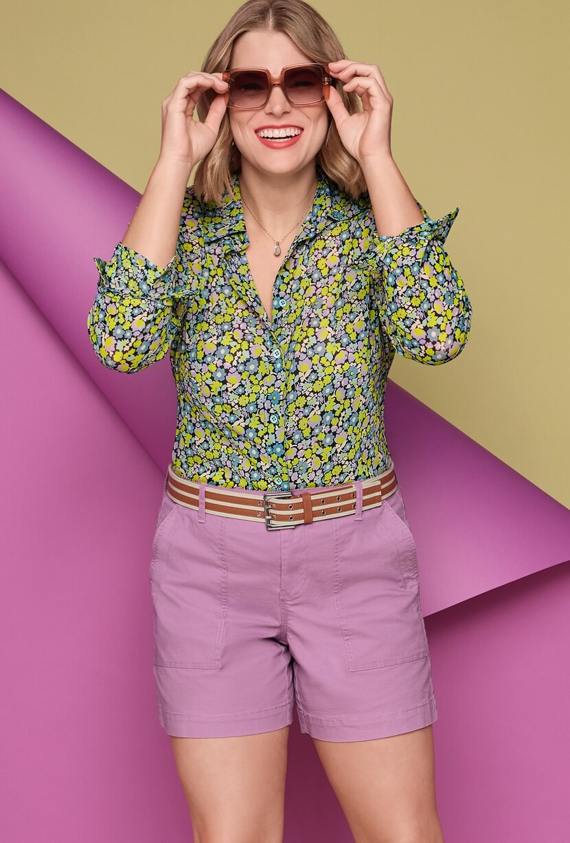 Model Wearing  Get Together Top in Blooming, Paperback Short in Orchid, Utility Belt in Multi, Lagoon Necklace in Gold.
